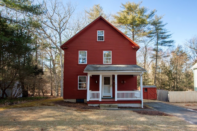 view of property featuring a porch