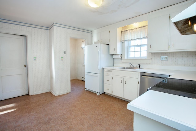 kitchen with white refrigerator, sink, stainless steel dishwasher, white cabinetry, and extractor fan