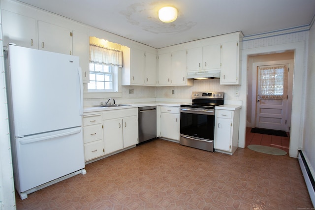 kitchen with sink, white cabinets, a baseboard heating unit, and appliances with stainless steel finishes