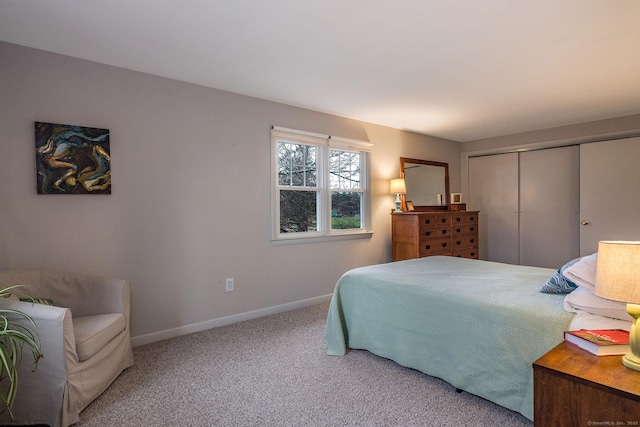 carpeted bedroom with a closet