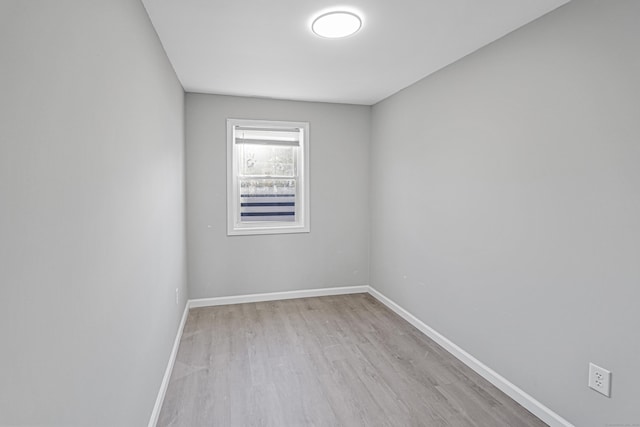 unfurnished room featuring light hardwood / wood-style flooring