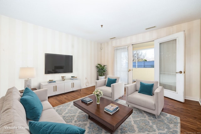 living room featuring dark hardwood / wood-style floors