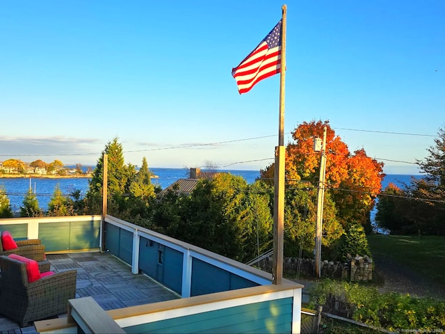 exterior space with a water view