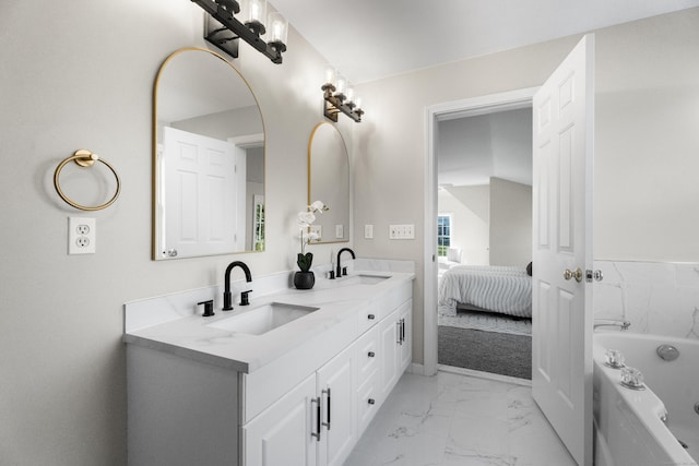 bathroom with vanity and a bathing tub