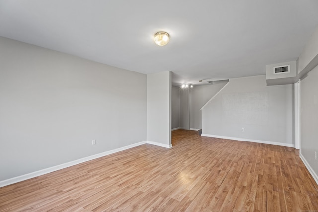 basement featuring light hardwood / wood-style flooring