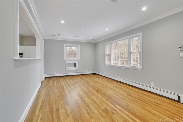 unfurnished living room with a wall mounted air conditioner, light wood-type flooring, baseboard heating, and ornamental molding