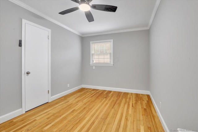 empty room featuring crown molding, ceiling fan, and light hardwood / wood-style floors