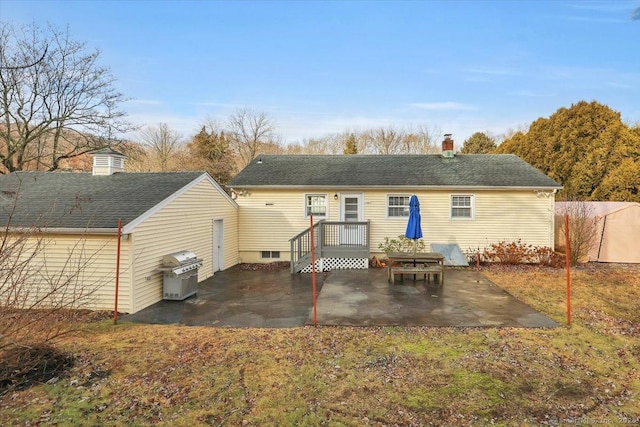 rear view of house with a patio area