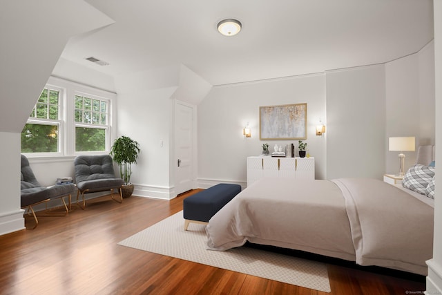 bedroom featuring hardwood / wood-style flooring