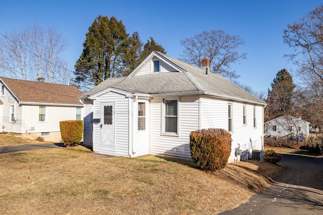 exterior space with a yard