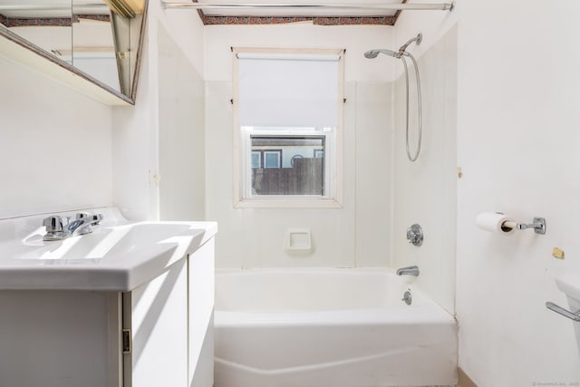 bathroom with shower / tub combination and vanity