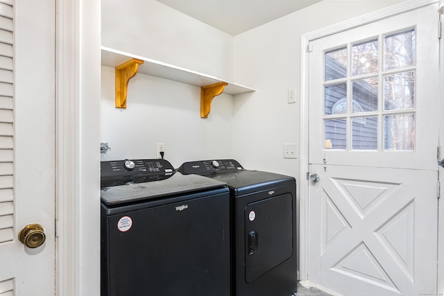 laundry area featuring washing machine and clothes dryer