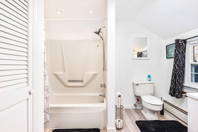 bathroom featuring lofted ceiling, a baseboard heating unit, hardwood / wood-style flooring, toilet, and shower / bathtub combination with curtain