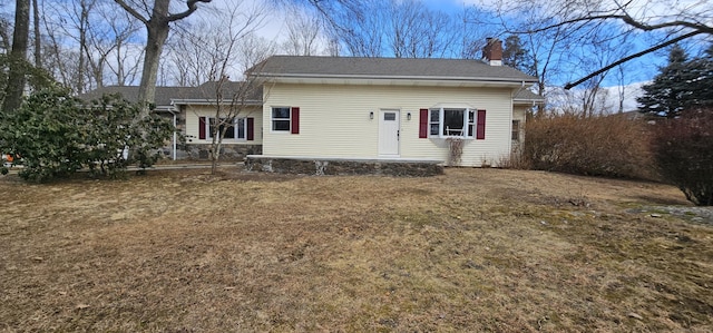 view of front of home with a front yard