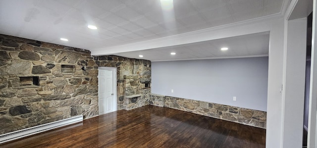 unfurnished living room with ornamental molding and hardwood / wood-style flooring