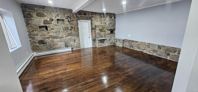 unfurnished living room featuring beam ceiling, baseboard heating, and hardwood / wood-style floors