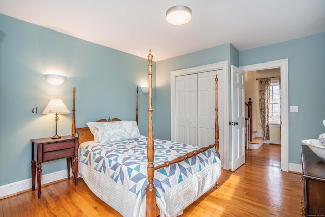 bedroom featuring a closet and wood-type flooring