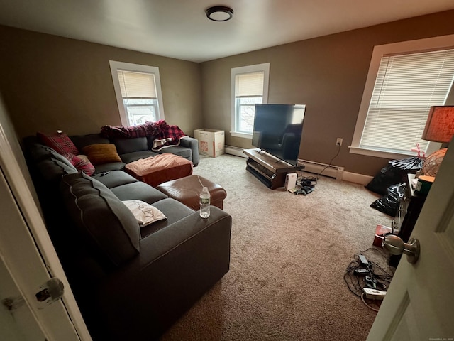 living room featuring carpet flooring and a baseboard heating unit