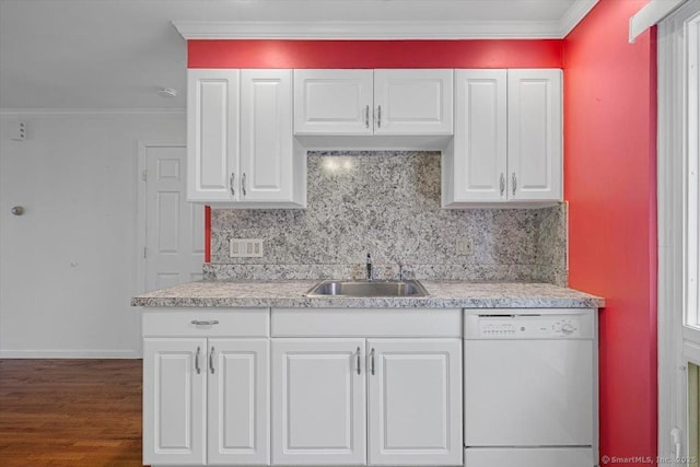 kitchen with dishwasher, white cabinets, sink, dark hardwood / wood-style floors, and decorative backsplash