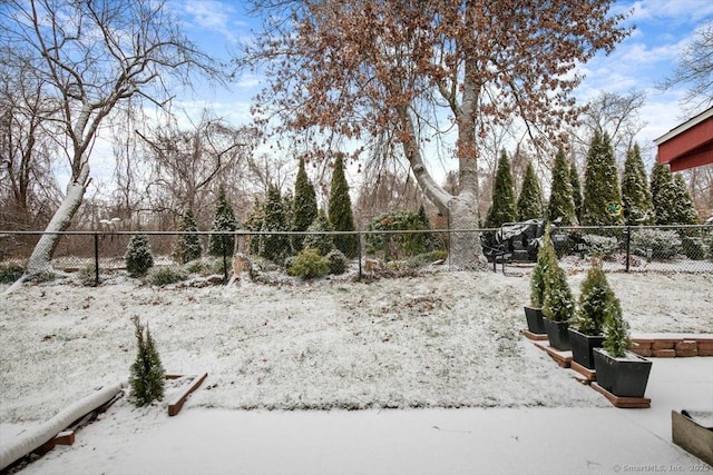 view of yard covered in snow