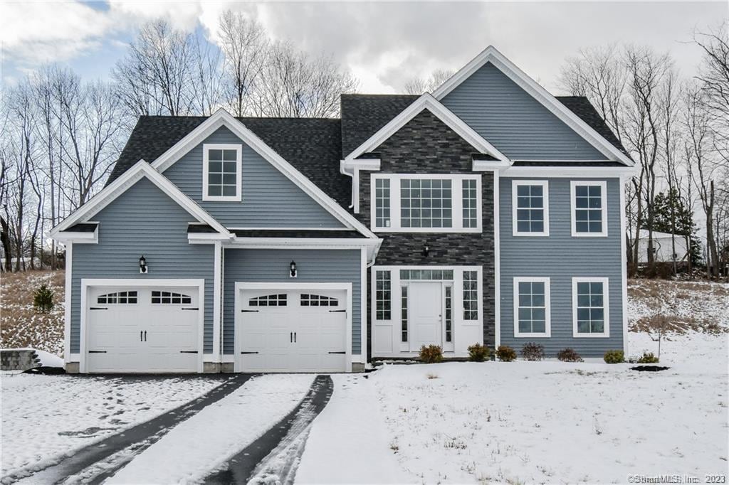 craftsman inspired home featuring a garage