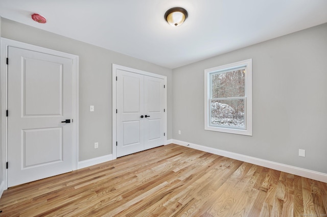 unfurnished bedroom featuring light hardwood / wood-style flooring