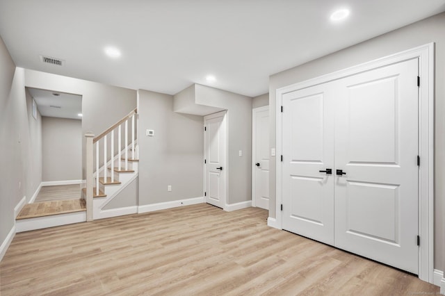 basement with light wood-type flooring