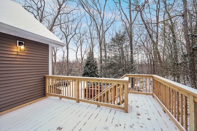 view of snow covered deck