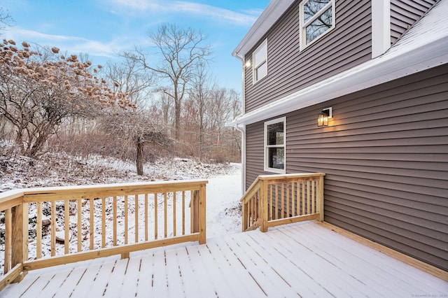 view of snow covered deck