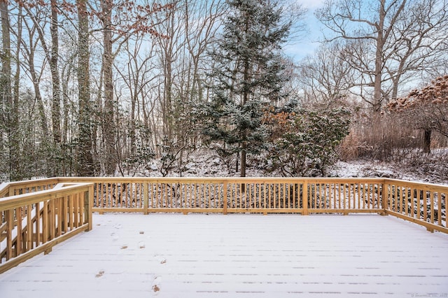 view of snow covered deck