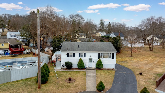 view of front of property with a front lawn