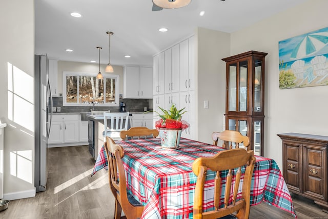 dining room with light wood-type flooring