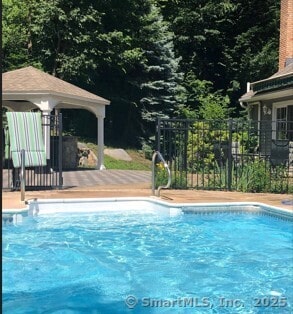 view of pool with a gazebo