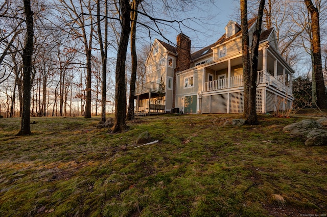 yard at dusk with central AC