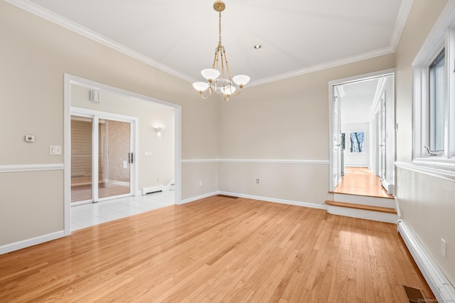 spare room with a baseboard heating unit, an inviting chandelier, ornamental molding, and light hardwood / wood-style floors