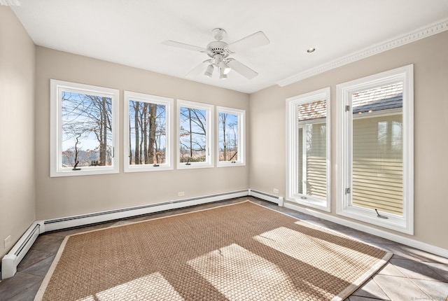 tiled spare room featuring ceiling fan and a baseboard radiator