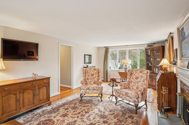 sitting room with light wood-type flooring