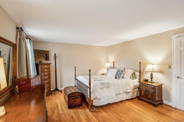 bedroom with light wood-type flooring