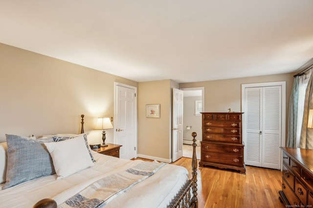 bedroom with light hardwood / wood-style floors