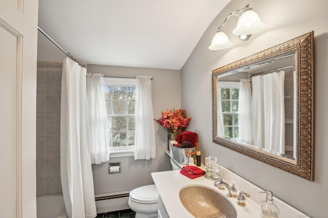 full bathroom featuring shower / bath combo, toilet, baseboard heating, and vanity