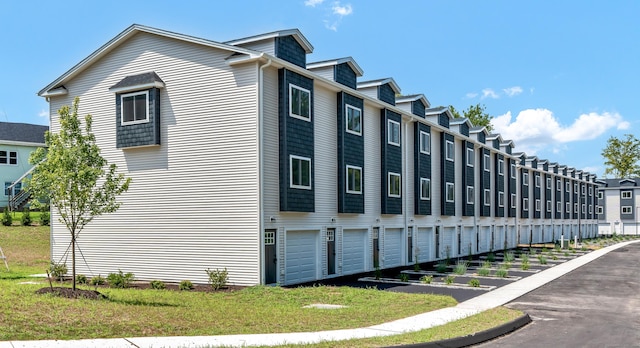 view of building exterior featuring a garage