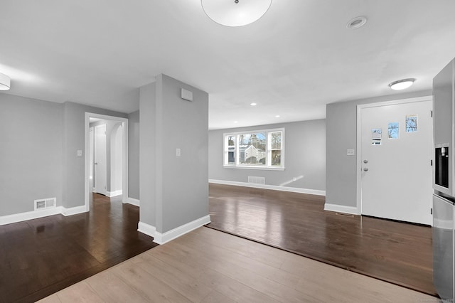 entryway featuring dark wood-type flooring