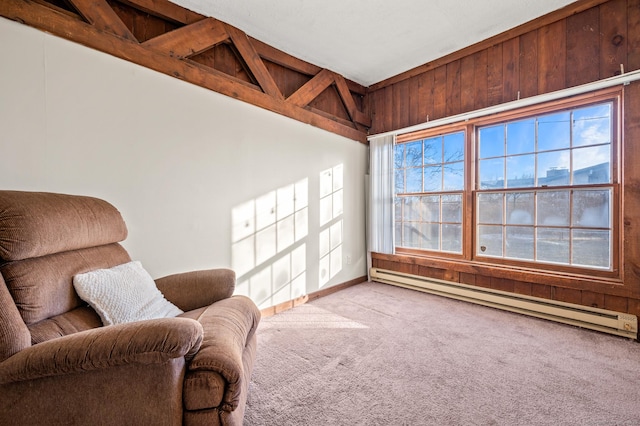 living area with vaulted ceiling with beams, light colored carpet, baseboard heating, and wooden walls