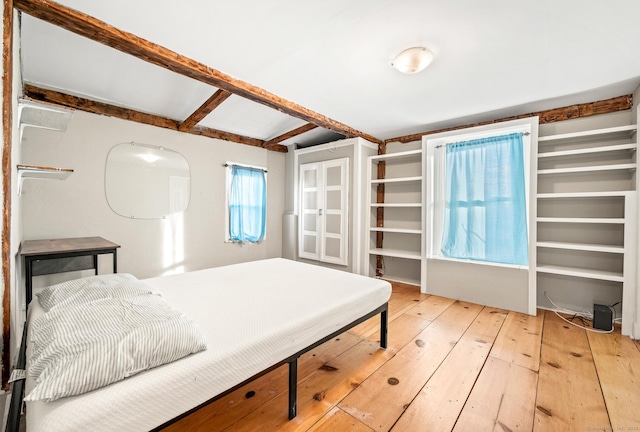 bedroom featuring light wood-type flooring