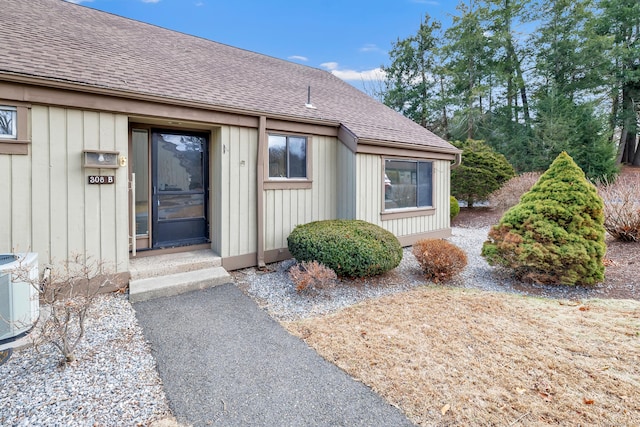 property entrance with central AC unit