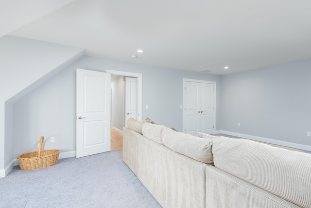 living room featuring light colored carpet