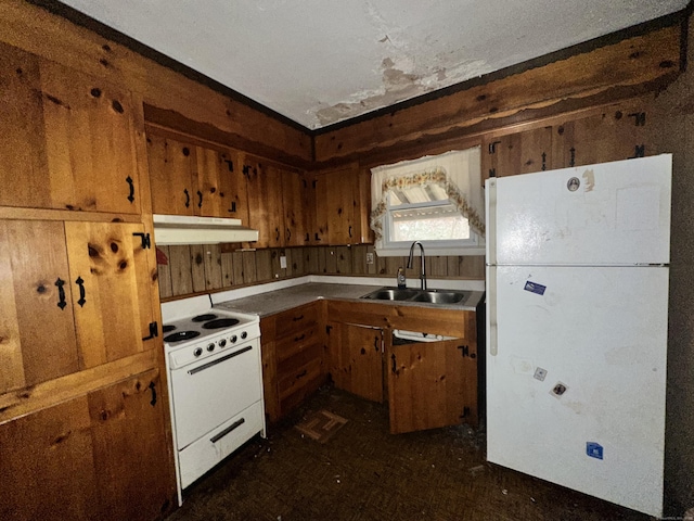 kitchen with sink and white appliances