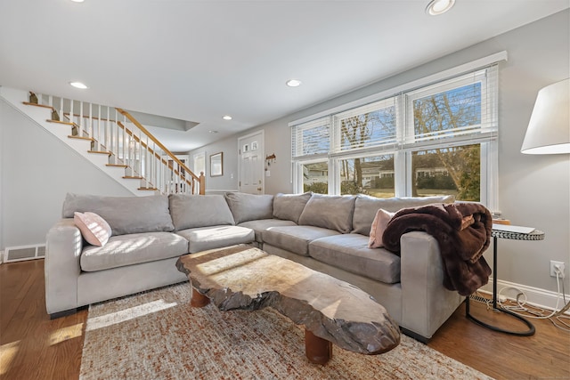 living room with dark hardwood / wood-style floors