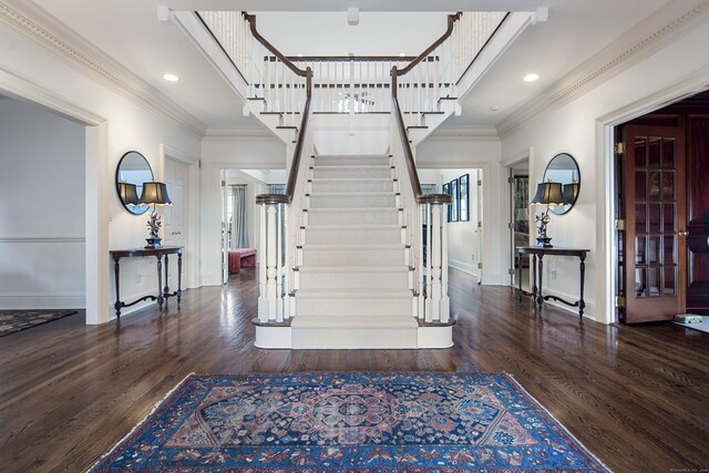 39 Keelers Ridge Rd, Wilton, CT 06897 - entrance foyer with baseboards, ornamental molding, wood finished floors, and stairway