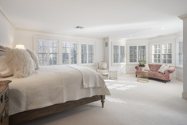 bedroom with carpet flooring and ornamental molding